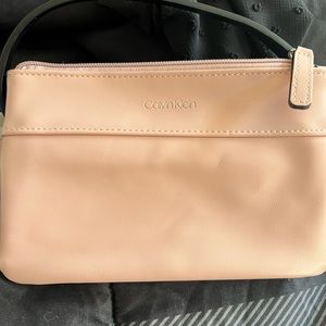 Calvin Klein Fanny pack. Light pink color, clean. Never been used but no tags.